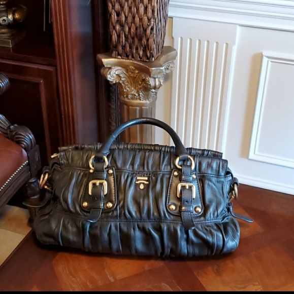 Prada Handbags - Authentic Prada bag size 15x8